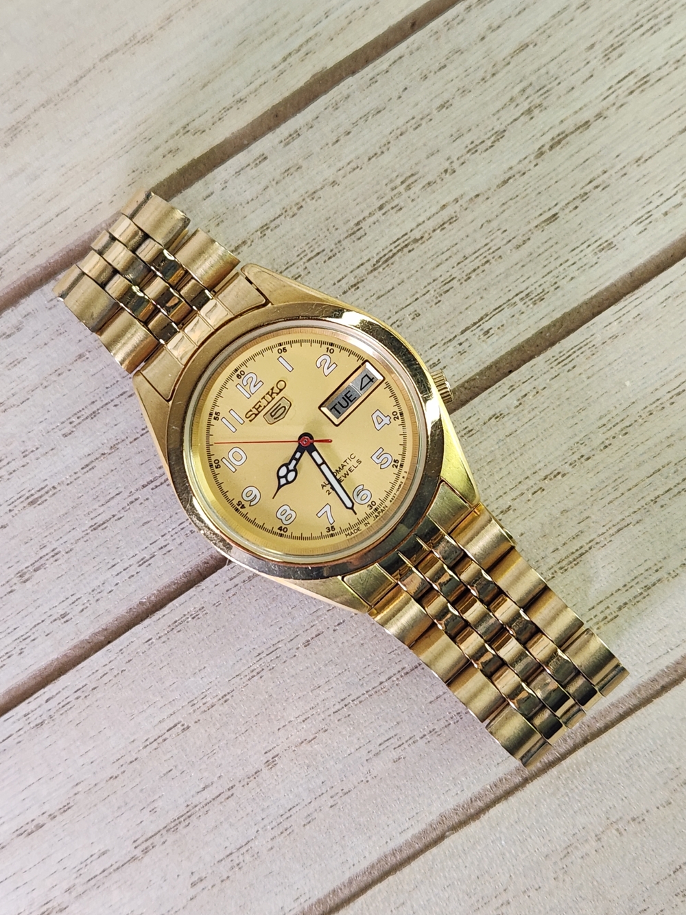 Seiko 5 Automatic Gold Tone Watch with Champagne Dial. Women